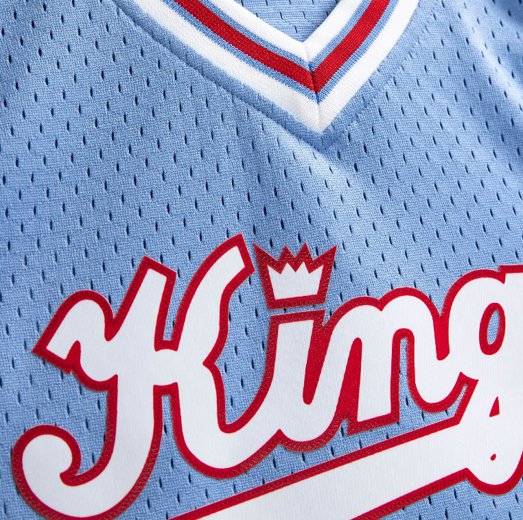 Men’s Reggie Theus Sacramento Kings 1985-86 Powder Blue Swingman Jersey By Mitchell & Ness